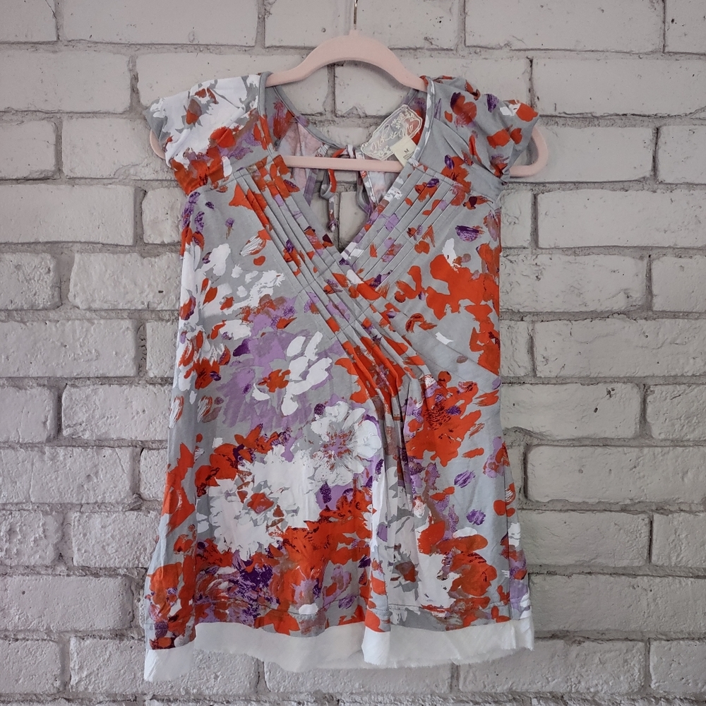 Perfect date night shirt with raw edge hemline, incredibly soft